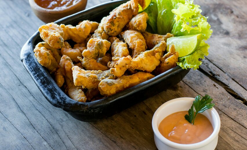 Cena a base di fritto misto di pesce e ballo liscio