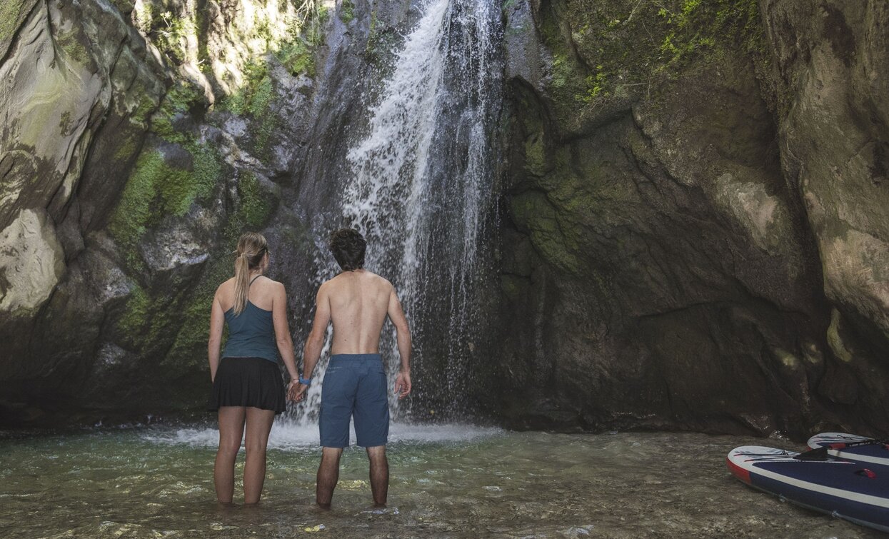 On SUP at the Ponale waterfall | © Archivio Garda Trentino (ph. Watchsome), Garda Trentino