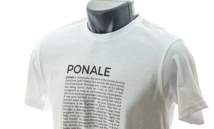 A white t-shirt with the word "PONALE" and a descriptive text. The t-shirt is displayed on a mannequin.