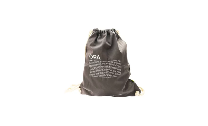 A gray fabric bag with a drawstring, adorned with clear text. Ideal for carrying small items.