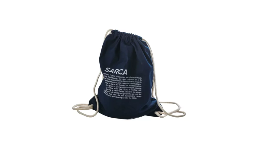 A dark blue backpack with a drawstring and white text. It is a practical and stylish accessory for everyday use.