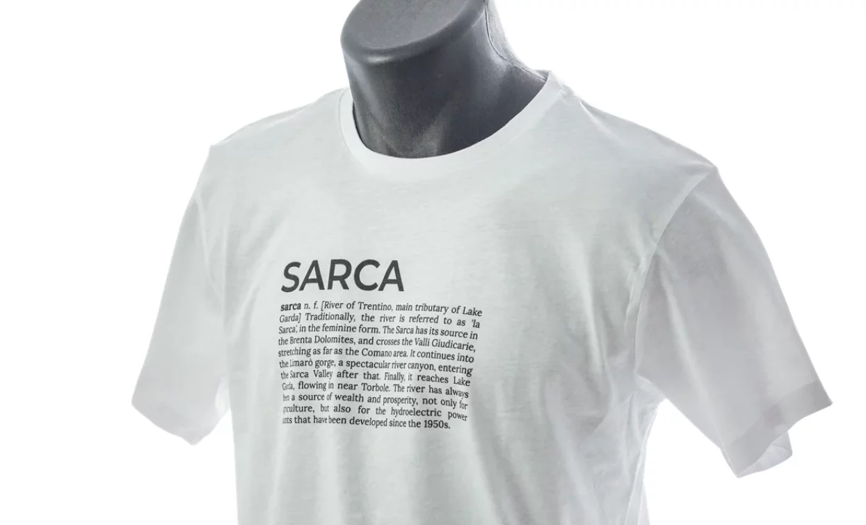 A white t-shirt with the word "SARCA" prominently displayed. The text provides a brief description of the term and its origin.